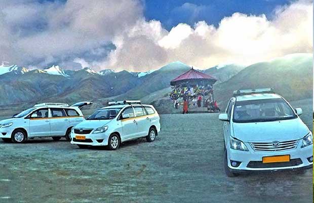 Taxis parked at a mountain pass